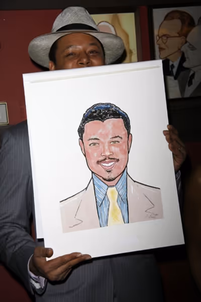 Terrence Howard with his caricature Photo