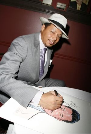 Terrence Howard with his caricature Photo