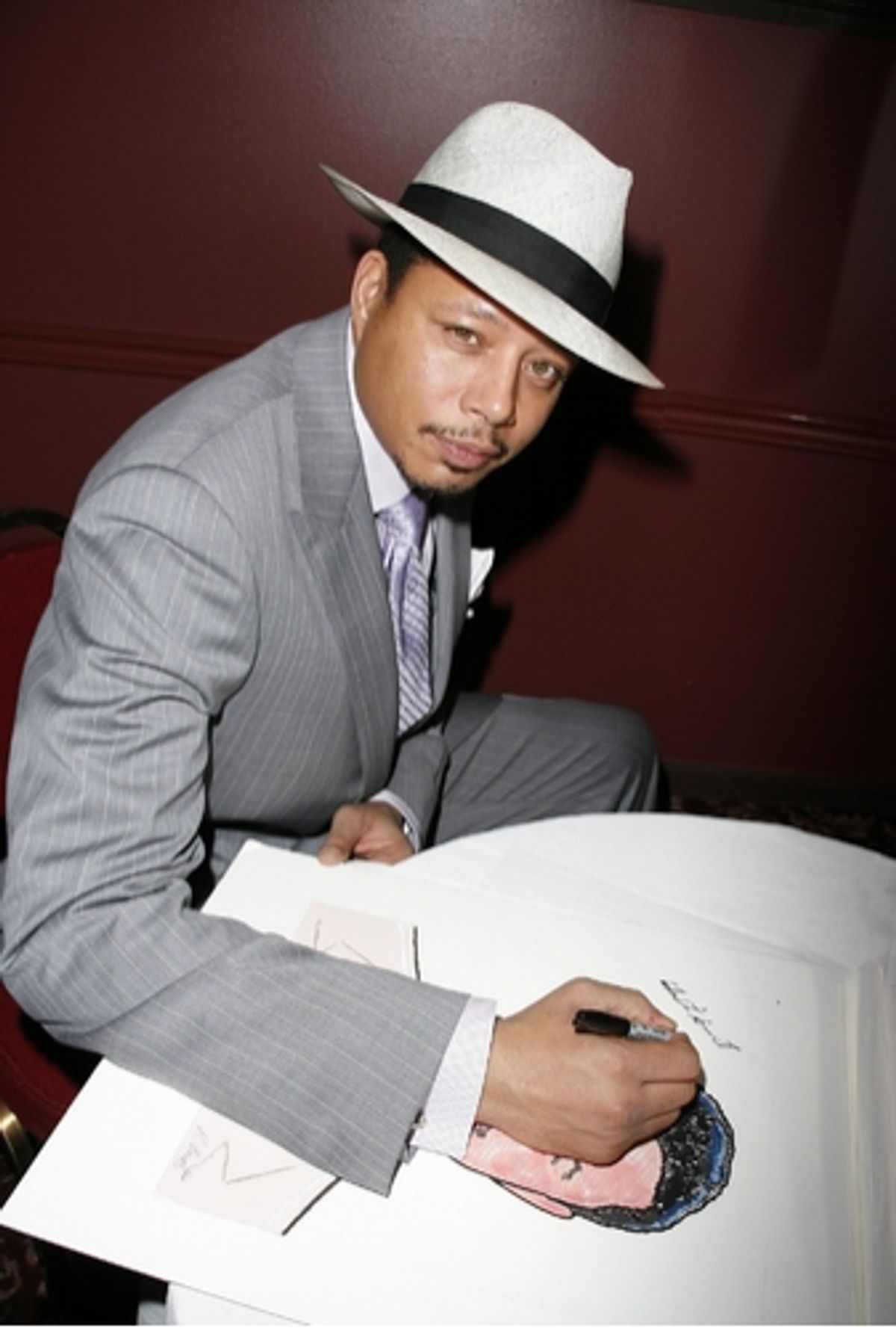 Terrence Howard with his caricature at 