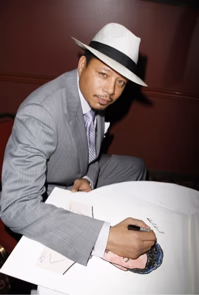 Terrence Howard with his caricature Photo