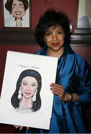 Phylicia Rashad with her caricature
 Photo