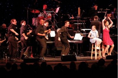 Lila Coogan and Donna Murphy with the Men's Ensemble Photo