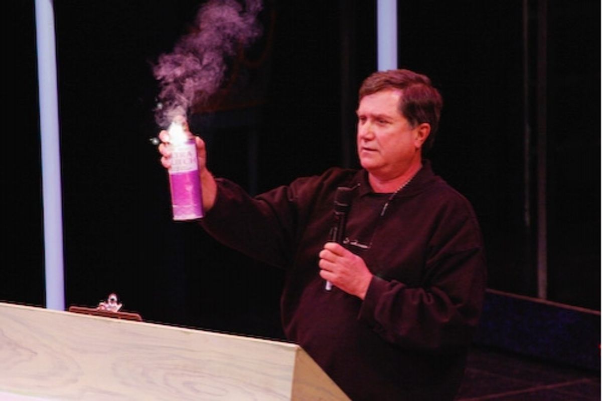 Michael Pilipski demos a sparking hairspray can
 at 