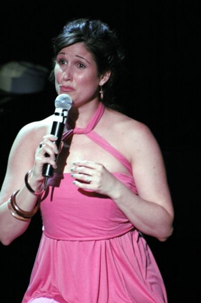 Stephanie J. Block singing "The Party's Over" Photo