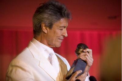 Tune accepts the Julie Harris Lifetime Achievement Award Photo