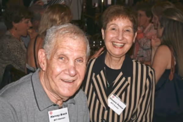 Harvey Brock, alumni guild and former board member, and Elenore Parker, alumna… Photo