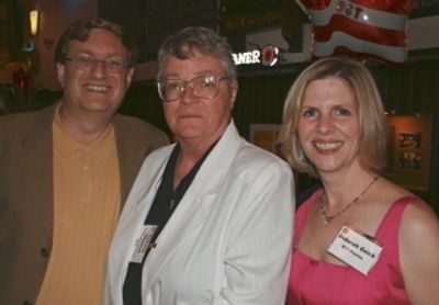 Hugh and Deborah Gelch of Newton flank retiring Executive Director Pat Gleeson
 Photo