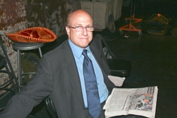 Capitol Steps pianist Marc Irwin getting the scoop on Boston politics backstage befor Photo