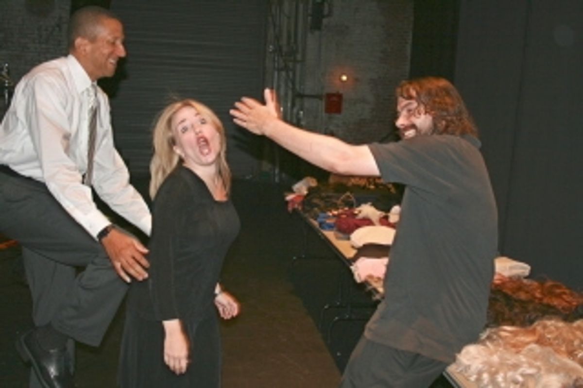 Capitol Steps castmates Morgan Duncan and Tracey Stephens getting into character backstage with the help of tech Jon Simler
 at 