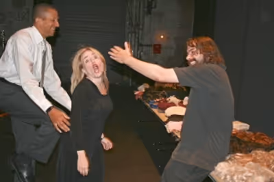 Capitol Steps castmates Morgan Duncan and Tracey Stephens getting into character back Photo