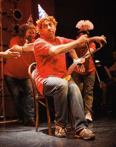 Jason Kravits breaks out the musical saw and puppy dog eyes
 Photo