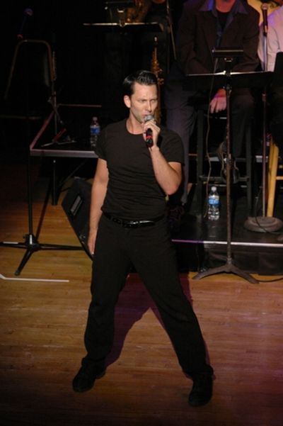 Bryan Jarrett-the evenings choreographer singing Witch Doctor
 Photo