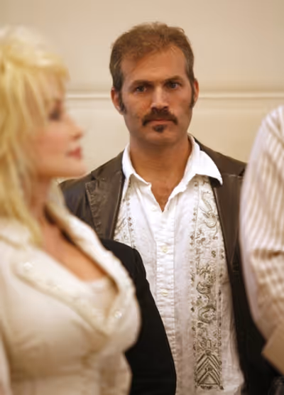 Dolly Parton and Marc Kudisch Photo