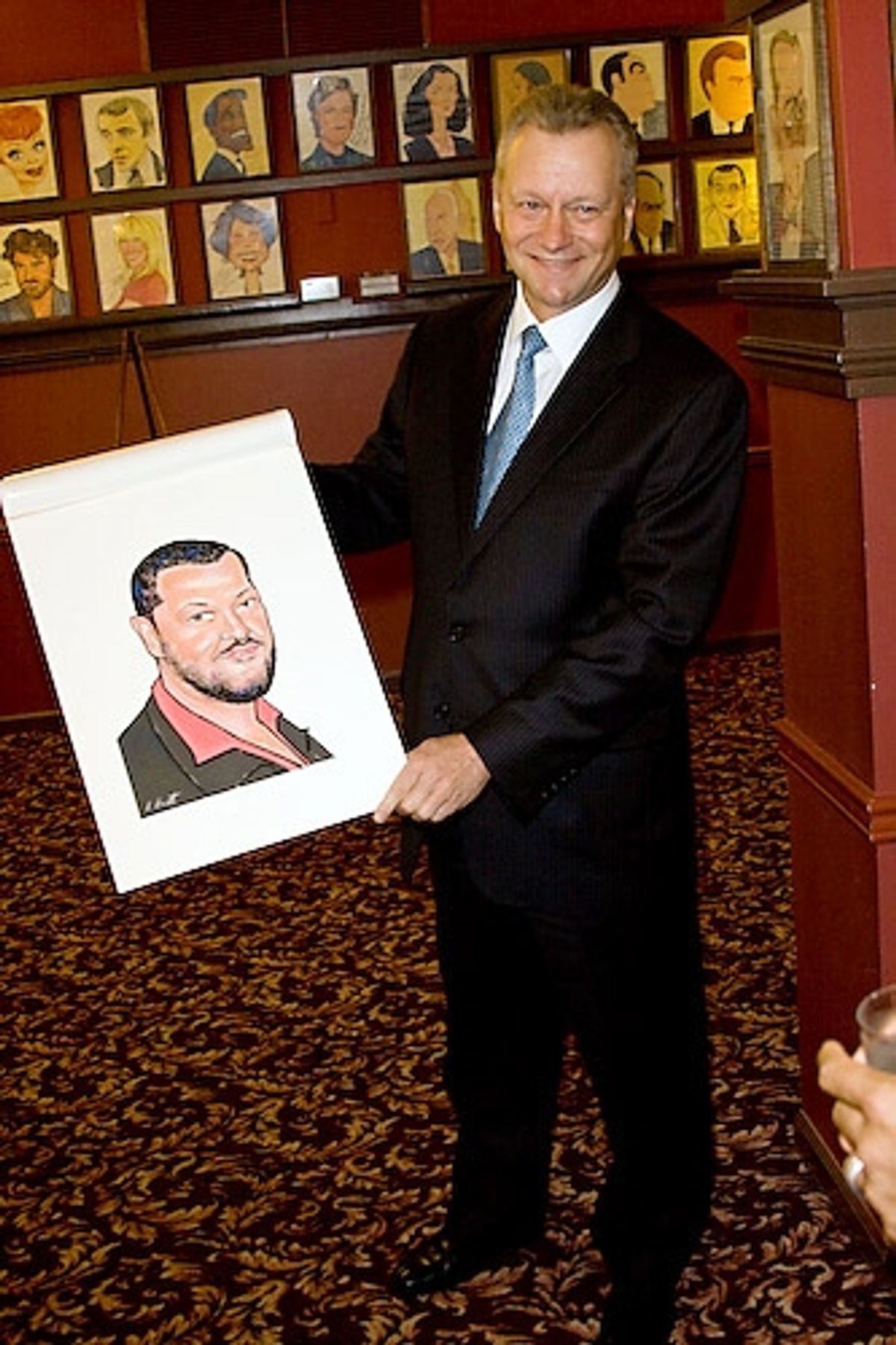 Max Kilmavicius unveils the caricature
 at 
