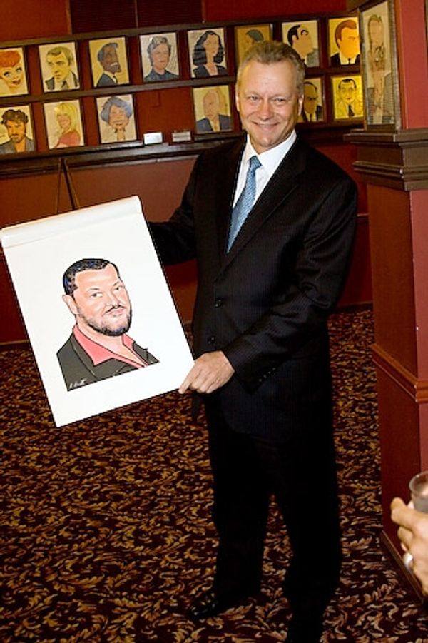 Max Kilmavicius unveils the caricature
 Photo