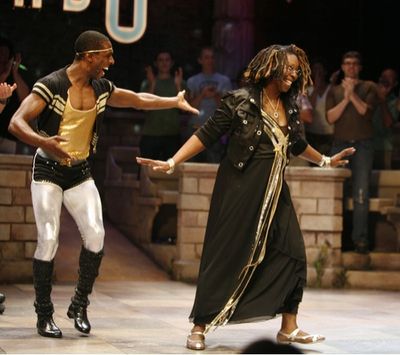 Whoopi Goldberg with cast member Andre Ward 
 Photo