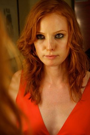 A focused Alicia looks in the mirror one last time before taking the stage Photo