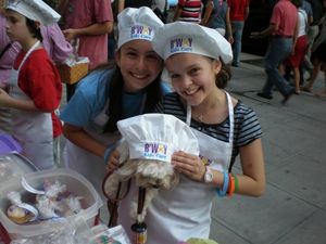 Nicole Bocchi and Kelsey Fowler get a little help from Kelsey's dog, Baxter Photo