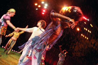 James Rado and Jonathan Groff come together as the cast dances around them
 Photo