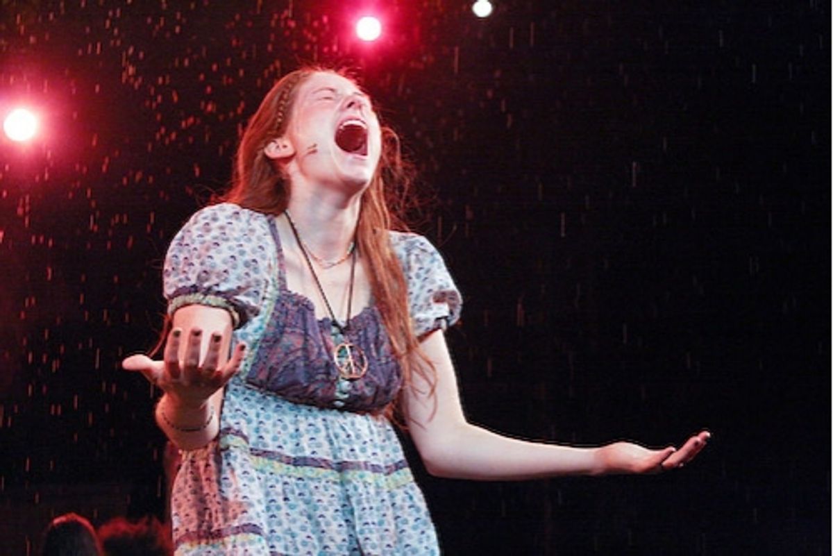 Allison Case takes in the rain
 at 