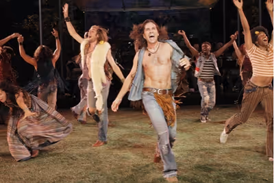 Bryce Ryness and Will Swenson dance with the Tribe  Photo
