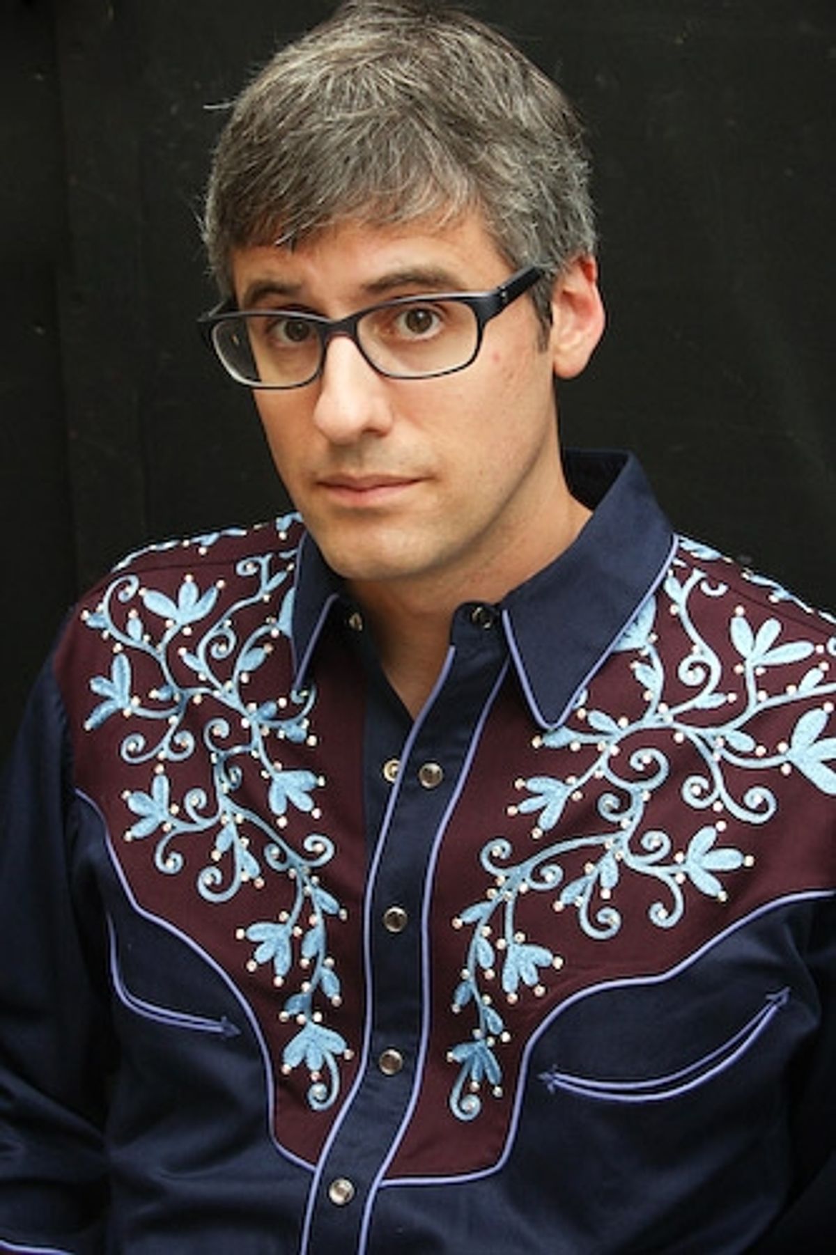 Host Mo Rocca at 