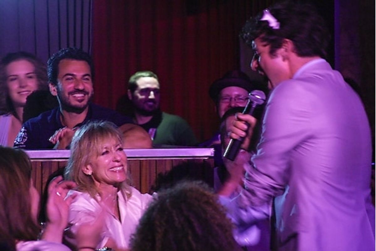 Michael Urie sings to audience member Judith Light at Broadway Loves the 80's