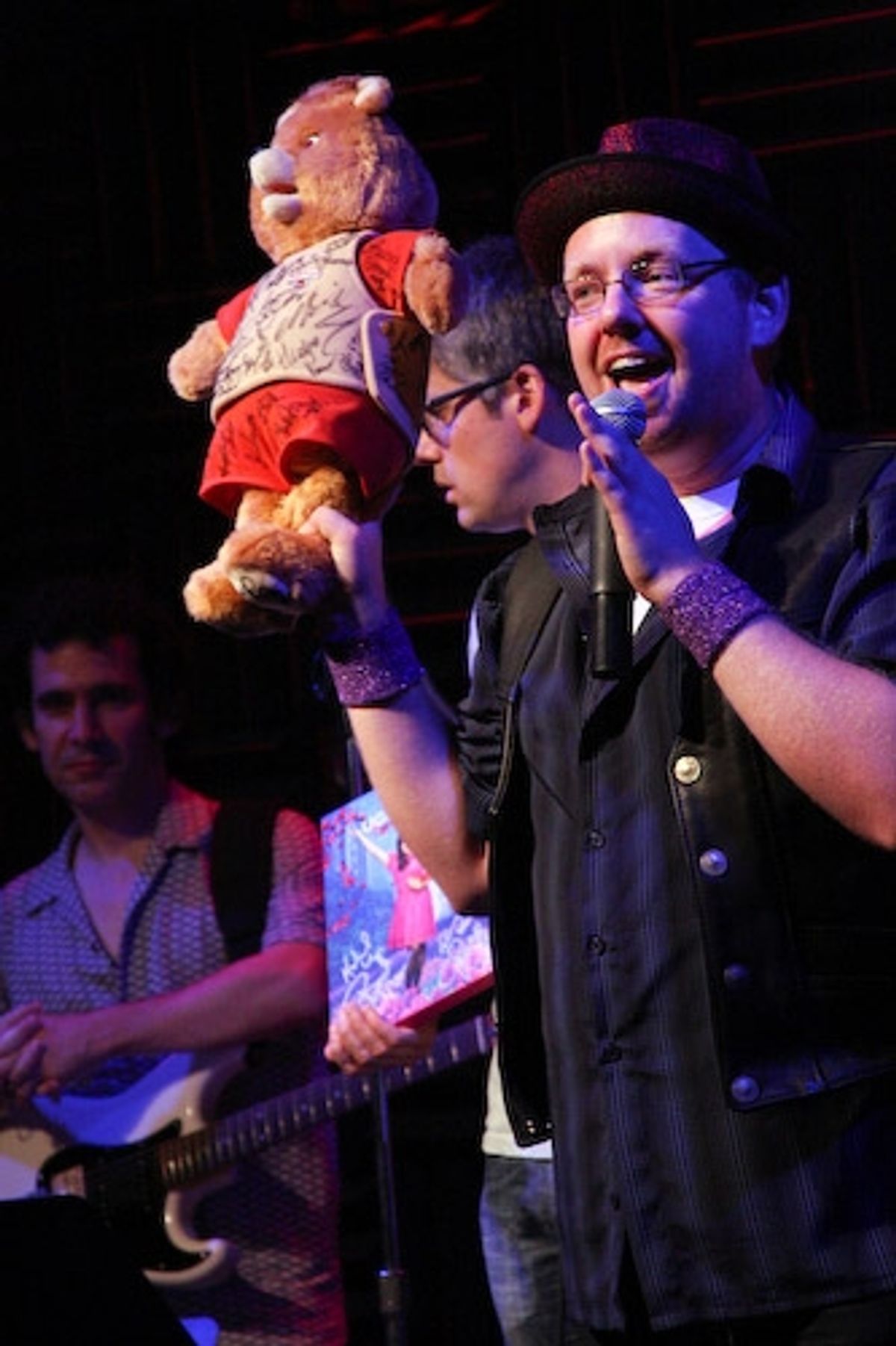 Jamie McGonnigal auctions off a Teddy Ruxpin signed by 100s of Broadway Stars at 