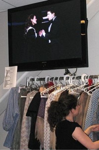 Michele Maika and John Lloyd Young on the backstage monitor Photo