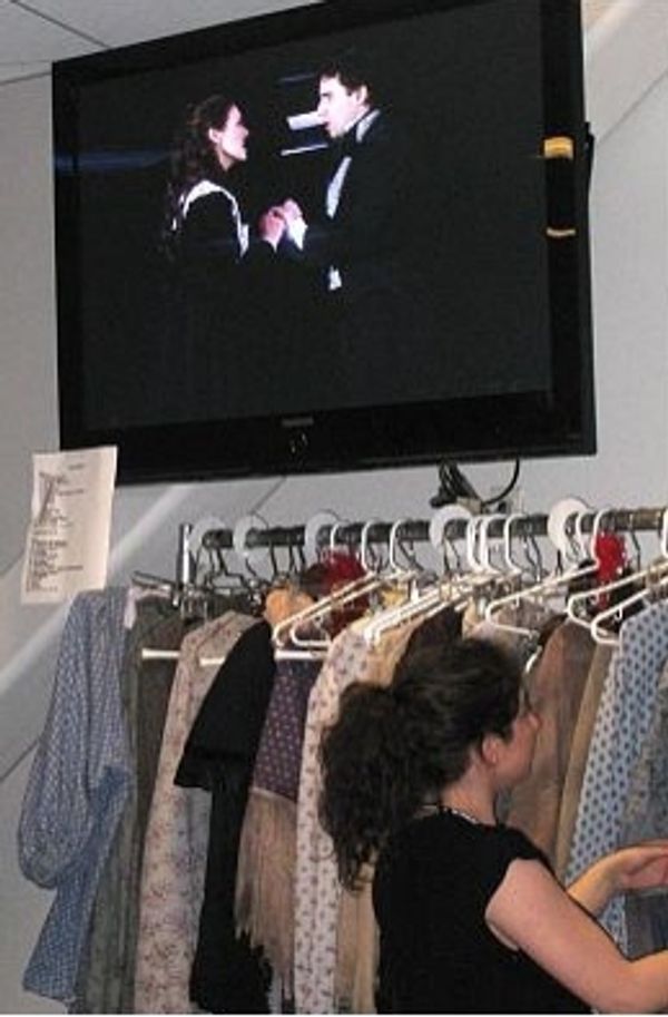 Michele Maika and John Lloyd Young on the backstage monitor Photo