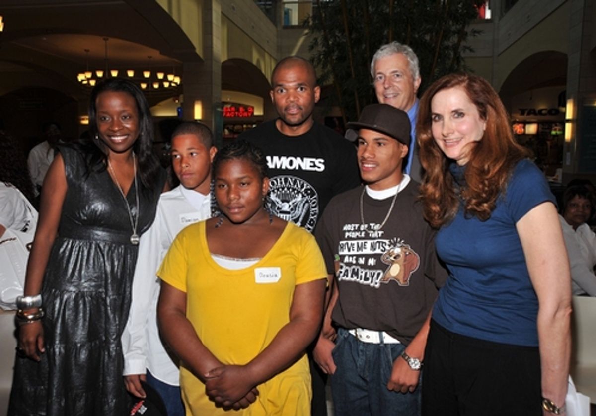 Jeannette Bayardelle, Darryl 'D.M.C' McDaniels, Herbert Stoop, and Laurie Sherman with the children

 at 