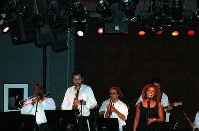 Asmeret Ghebremichael and the back up horns Turntable on the Hudson Photo