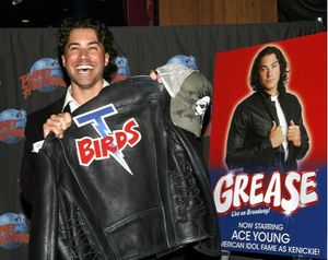 Ace Young displays his T-Birds jacket Photo