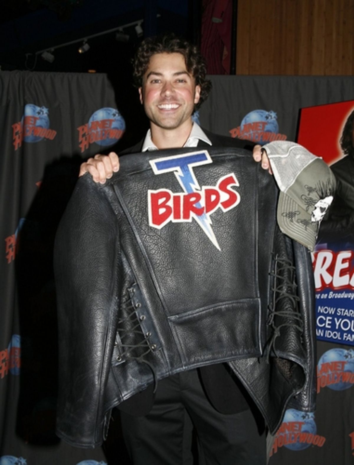 Ace Young displays his T-Birds jacket at 