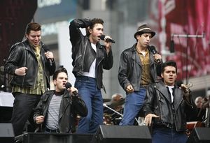 Ace Young and the cast of Grease Photo