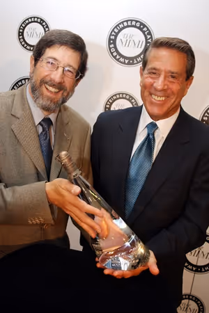 James and Michael Steinberg, with the award named after their mother, Mimi. @ BroadwayWorld James and Michael Steinberg, with the award named after their mother, Mimi. Photo
