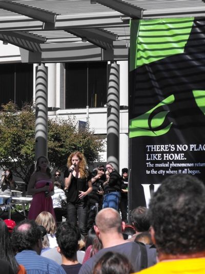 Caissie Levy as "Glinda" and Emily Rozek as "Elphaba" perform at the WICKED homecomin Photo