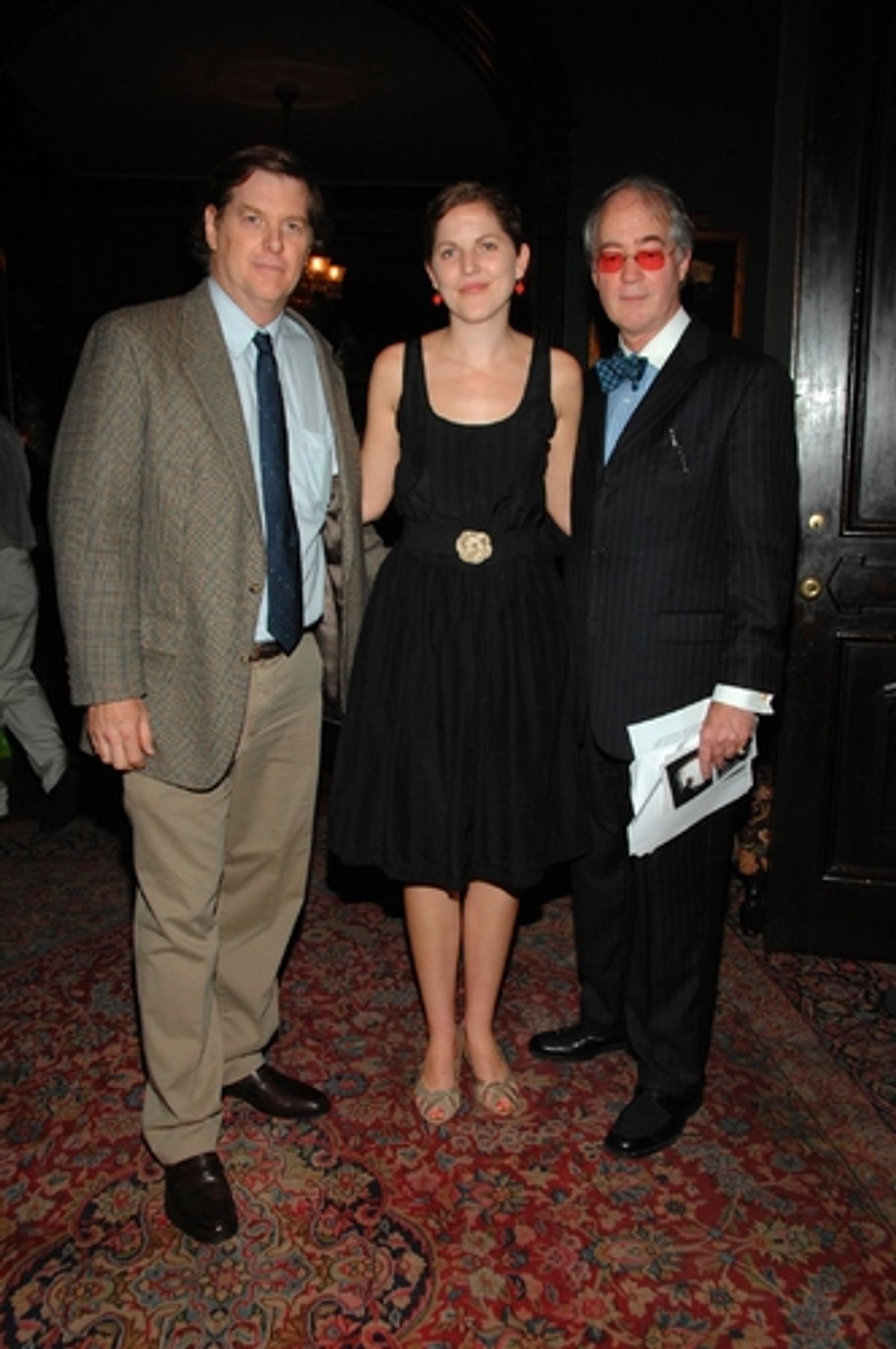 Byers and Clark stand with Aldon James before speaking about their photographs to the crowd of Arts Club members and Manhattan art enthusiasts at 