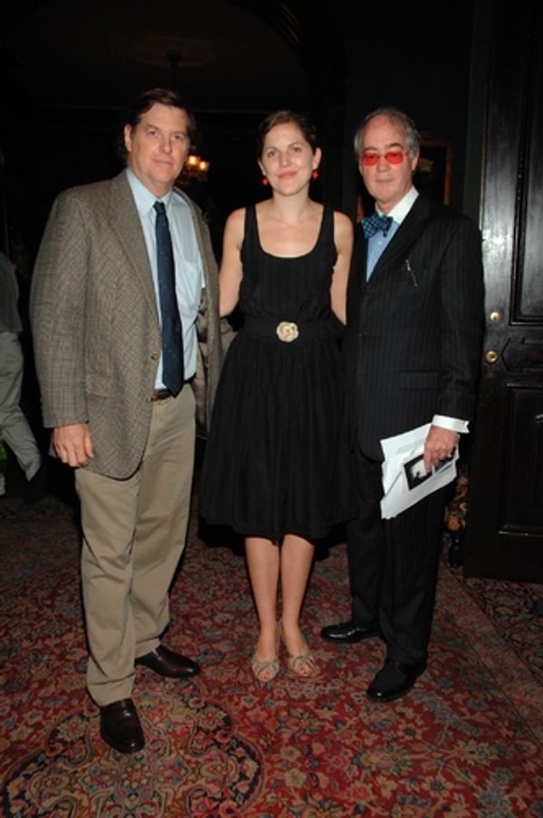 Byers and Clark stand with Aldon James before speaking about their photographs to the Photo