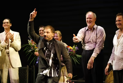 Simon McBurney and the cast
 Photo