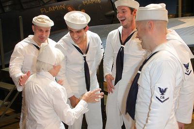 Edith Shain shares stories with the guys from South Pacific

 Photo