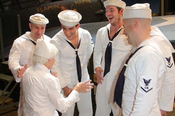 Edith Shain shares stories with the guys from South Pacific

 Photo