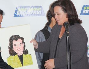 Rosie is presented with her own caricature @ BroadwayWorld Rosie is presented with her own caricature Photo