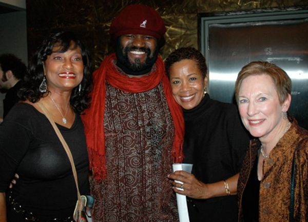 Stars Eloise Laws and Greg Porter pose for a photo with the public relations team, Su Photo