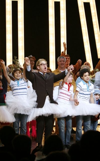 Kiril Kulish, Elton John, Trent Kowalik and David Alvarez Photo