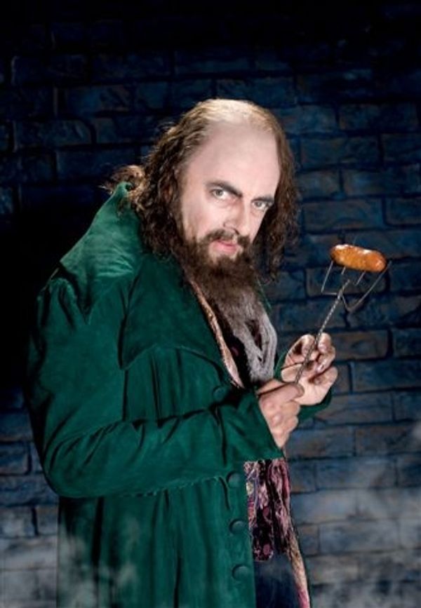 Rowan Atkinson as Fagin Photo