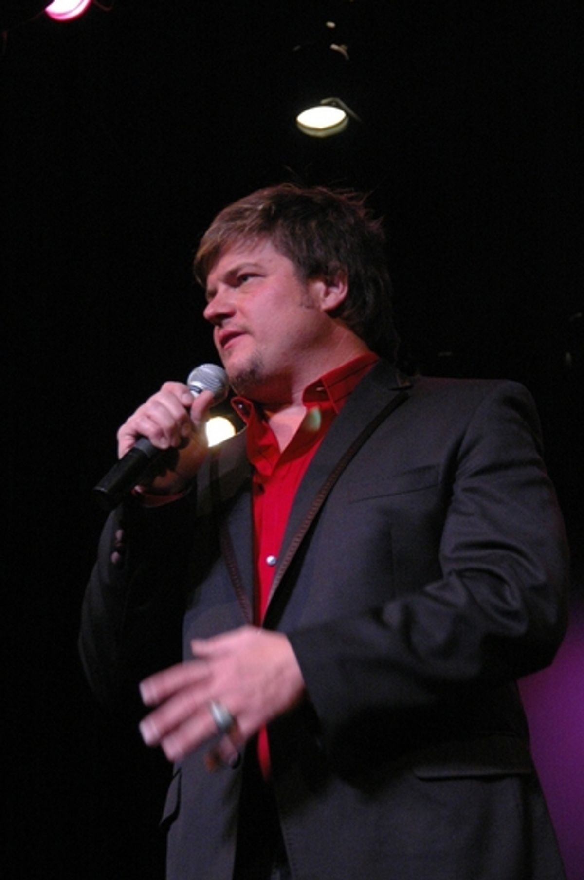 Rob Evan bringing the cast on for the final number at Irvington's All Star Broadway Holiday Concert