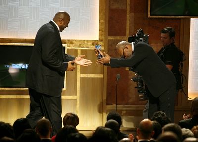 Earvin "Magic" Johnson and Samuel L. Jackson

 Photo