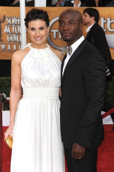 Idina Menzel and Taye Diggs

 Photo