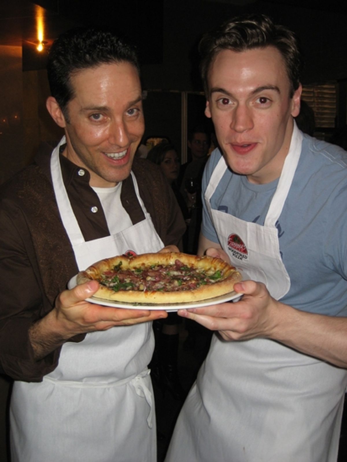 Jeff Leibow and Erich Bergen with their finished pizza pie - 'Gyp's Basement Pizza' at 